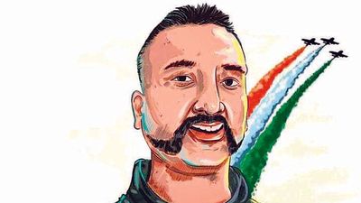 Artist is busy in painting of Indian pilot Wing Commander, Abhinandan  Varthaman on aircraft whose plane was shot down over Azad Kashmir in  connection Surprise Day organized by Sky Wings, in Karachi