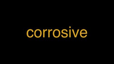 no corrosive action meaning in hindi